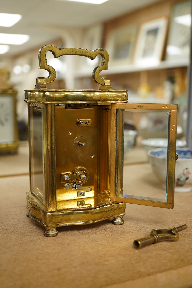 An early 20th century French gilt brass four glass carriage timepiece with key, 15cm high